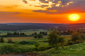 Color evening meadow near Bozi Dar village with sunshine