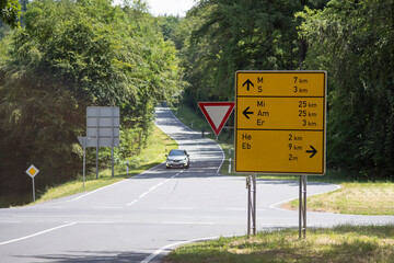 road junction with information signs empty with font size pattern