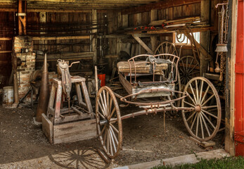 Fototapeta na wymiar old fashioned horse drawn wagon in a barn Scugog Shores Port Perry Ontario