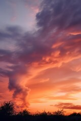 Fototapeta premium a sunset with a big cloud in the sky over a field. AI Generated