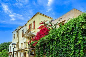 Fototapeta na wymiar Greece travel destination, colorful streets of Crete island city Chania in historic city center.