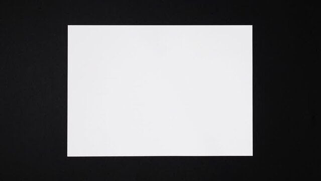Sheet of paper folds into rectangles and disappears
