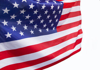 Fototapeta premium Isolated USA flag waving in the wind on a white background.
