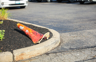 bright orange construction cones arranged in a line, symbolizing safety, caution, and ongoing...