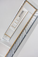 Looking up through staircase. Conceptual for vertigo and fear of heights