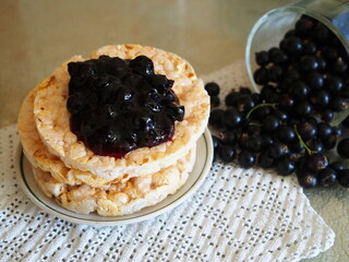 Currant jam on crusty bread.