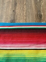 poncho background Cinco de mayo Mexican serape fiesta falsa pattern traditional culture blanket with stripes pattern copy space fabric textile material Mexican backdrop - stock photo photograph image