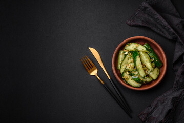 Delicious juicy cucumber cut into large slices with salt, spices and french mustard