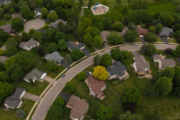 Road Curves Through Neighborhood Cul-de-Sac in Upper Left
