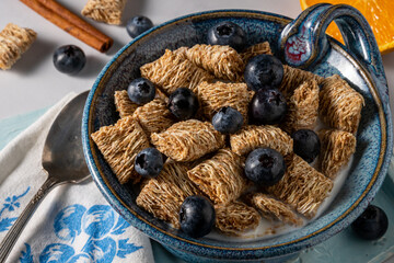Whole wheat organic cereal with blueberries.