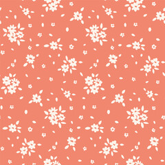 Seamless floral pattern, liberty ditsy print of mini cute flowers in two colors. Pretty rustic botanical design: small hand drawn flowers, tiny leaves on a gentle pink background. Vector illustration. © Yulya i Kot