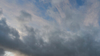 A terrible black cloud hangs in the sky before the rain. Bad weather. Hurricane and thunder over the city. Climate change and natural disasters. Bad mood and despondency.