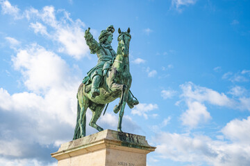 Equestrian statue of Louis XIV in front of the palace of Versailles near Paris, France.