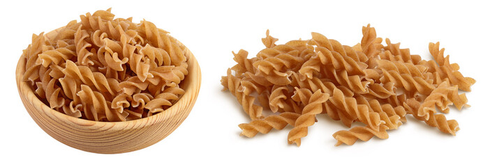 Wolegrain fusilli pasta from durum wheat in wooden bowl isolated on white background with  full depth of field.