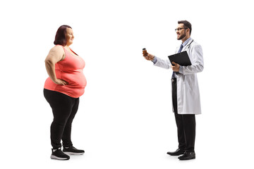 Full length profile shot of a doctor giving a bottle of pills to an overweight young woman