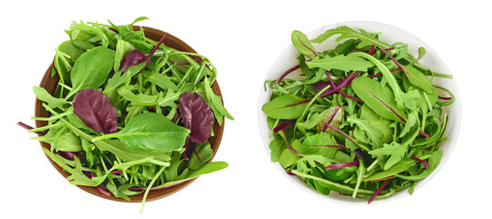 Mix salad - arugula, spinach and chard in the bowl isolated on white background. Top view. Flat lay