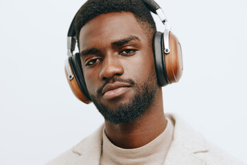 headphones man isolated portrait studio black african american guy music background dj fashion