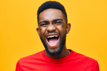 Fototapeta premium man african orange fashion american smiling guy happy red black american background portrait