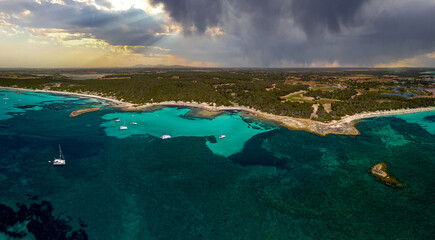 Es Tranc Beach Mallorca, Blue Water at mediterranean sea in the style of aerial photography, Aerial Panorama, Dark clouds, Tropical, stormy seascapes, Mallorca landscapes, high dynamic range Panorama