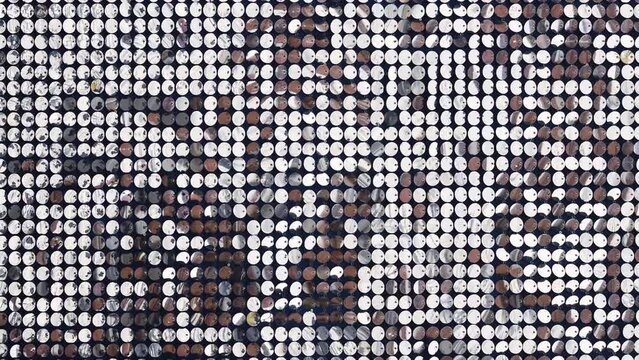 Silver mirror sequins sparkle and move in the wind, dynamic sparkling background