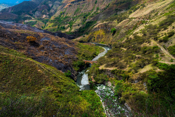 Fototapeta na wymiar Juanambu canyon, river, mountain and bridge.