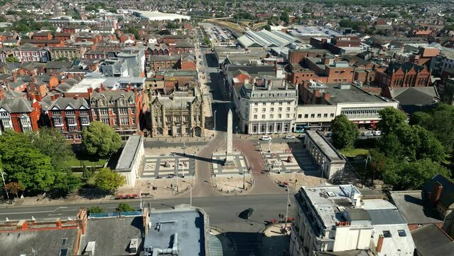 Southport, Lancashire, UK, June 24, 2023; Mid-level close up aerial orbital clip video footage of the war memorial and cenotaph on Lord Street in Southport, England