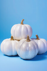 autumn composition with white pumpkins on a blue background. Halloween, Thanksgiving party. Generative, Generative AI