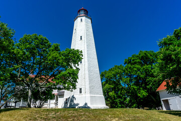 The Sandy Hook Lighthouse, situated in New Jersey, United States, is a historic maritime landmark. Its rich architectural heritage and panoramic views of the Atlantic Ocean makes it a nautical gem.