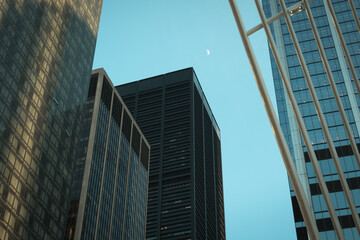 The moon in the evening sky, at the Oculus, Manhattan, New York
