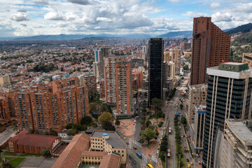 7th avenue between tall buildings in a financial area of Bogota. Colombia