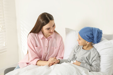 Fototapeta premium Childhood cancer. Mother and daughter in hospital