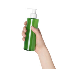 Woman holding bottle of face cleansing product on white background, closeup