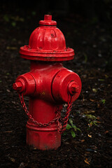 Fototapeta na wymiar fire hydrant on a dark background, used for fire fighters to get water to a fire emergency quickly