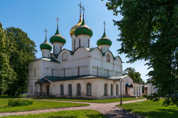 Fototapeta na wymiar View of the Transfiguration Cathedral on the territory of the architectural and museum complex of the Spaso-Evfimiev Monastery on a sunny summer day, Suzdal, Vladimir region, Russia