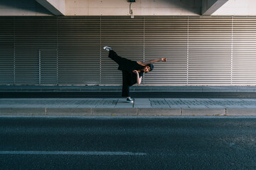 Young woman dancing on the streets of Spain