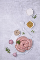 Raw sausages in a natural casing