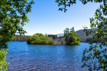 Castle Ruins on an Island in the Middle of a Loch an Eilein in the Scottish Highlands United Kingdom