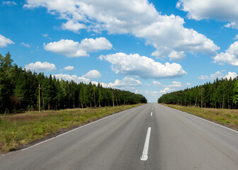 Fototapeta premium abstract empty road in summer, blue sky, white clouds, highway or speedway in rural countryside created with generative ai technology