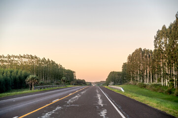 View of an empty road at sunset.