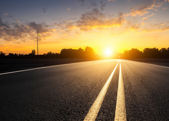 Obraz premium abstract empty asphalt road at night sunset or sunrise with lights created with generative ai technology