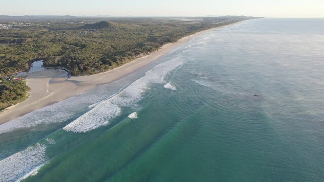 Coolum Beach And Stumers Creek On A Cold Morning With Sea Mist. - aerial