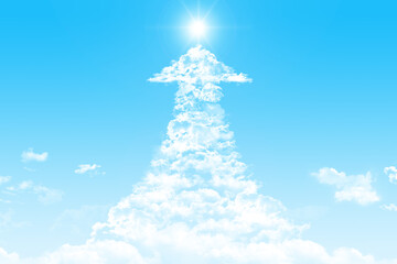 青空にかかる上昇矢印の雲