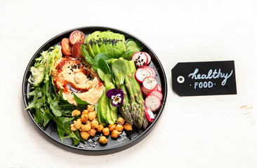 Healthy vegetarian, vegan dish with vitamins, antioxidants, protein, fiber  on light background.