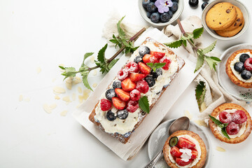 Dessert table. Top view, Summer cake with berries. Healthy dessert concept.