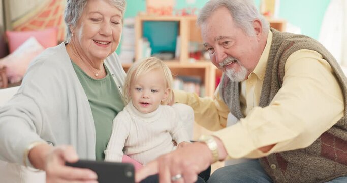 Selfie, happy and senior couple with their grandchild bonding, playing and spending time at home. Happiness, smile and elderly man and woman in retirement taking picture with girl kid in their house.