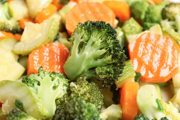 Tasty fried vegetables as background, closeup