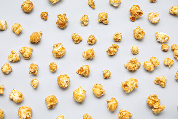 Tasty popcorn on grey background