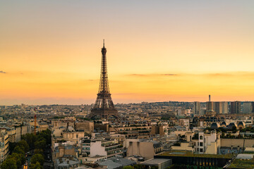 Fototapeta na wymiar Skyline of Paris by sunset with Eiffel Tower
