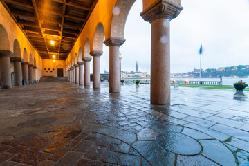 City hall with view of the garden by rain at sunset, Stockholm, Sweden