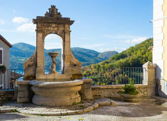 Fontana del Tritone in Castel di Tora with Lake Turano, beautiful village in the Province of Rieti....